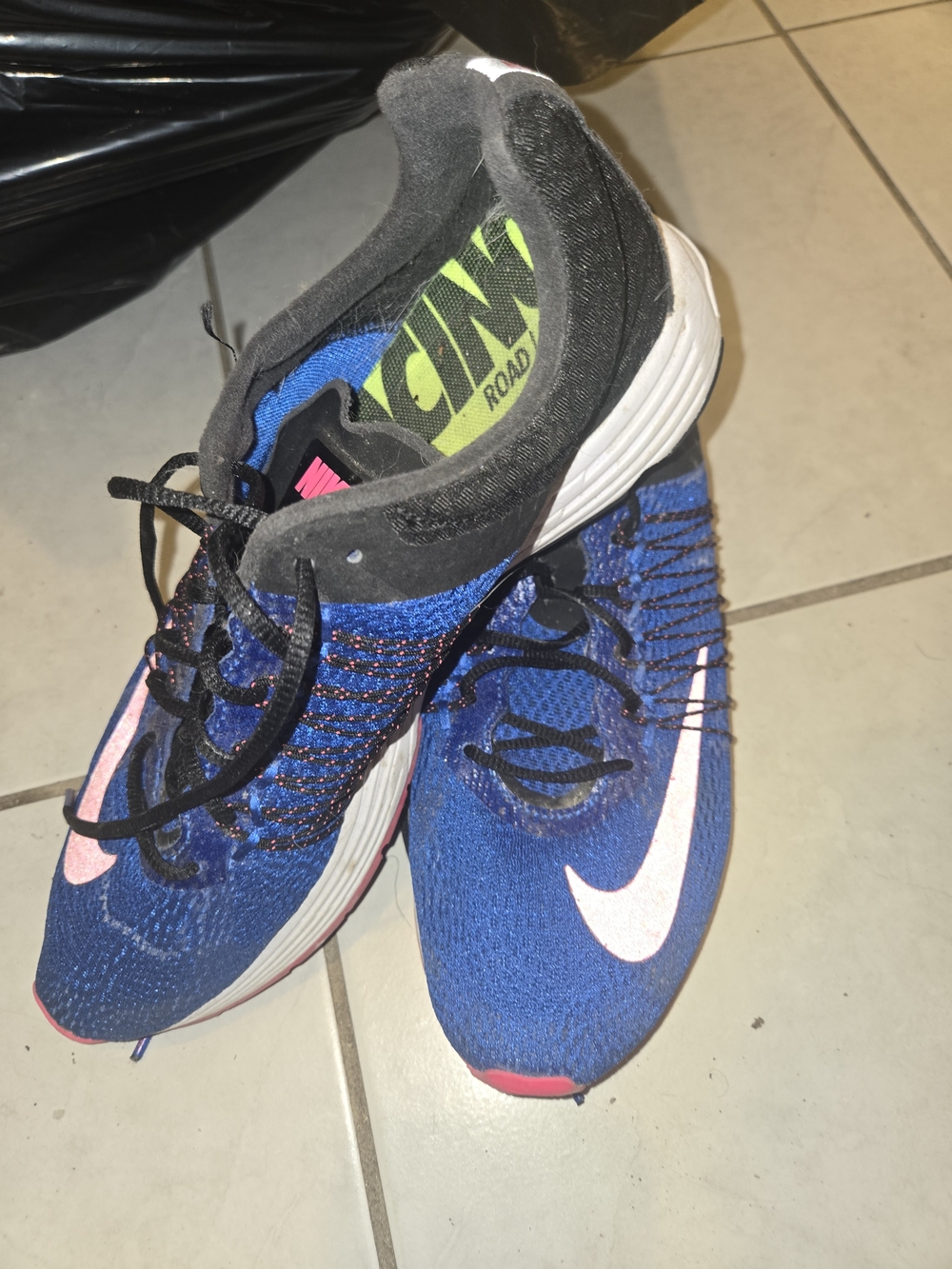 Nike Blue Running Sneakers with Pink Swoosh and Black Trim